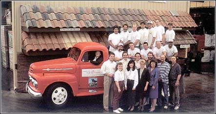 The South Coast Shingle crew with a restored 1950s delivery truck