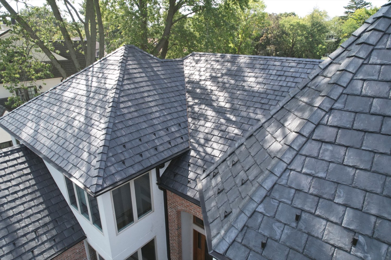 Composite imitation slate and shake roof